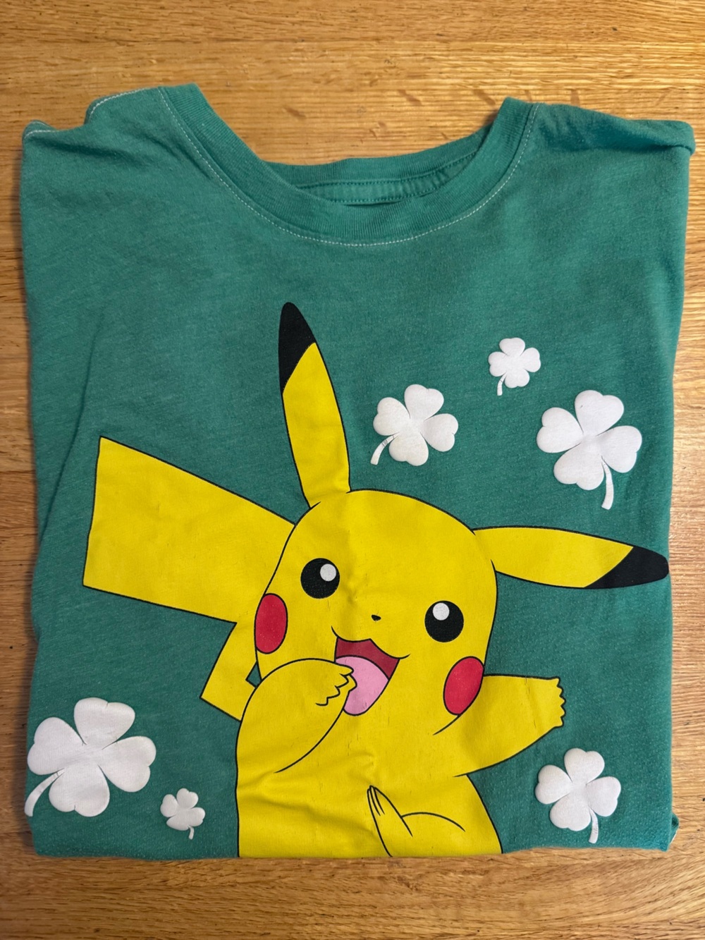 🎱 Pokemon Kids Green Tee with Yellow Pikachu and White Clover Accents